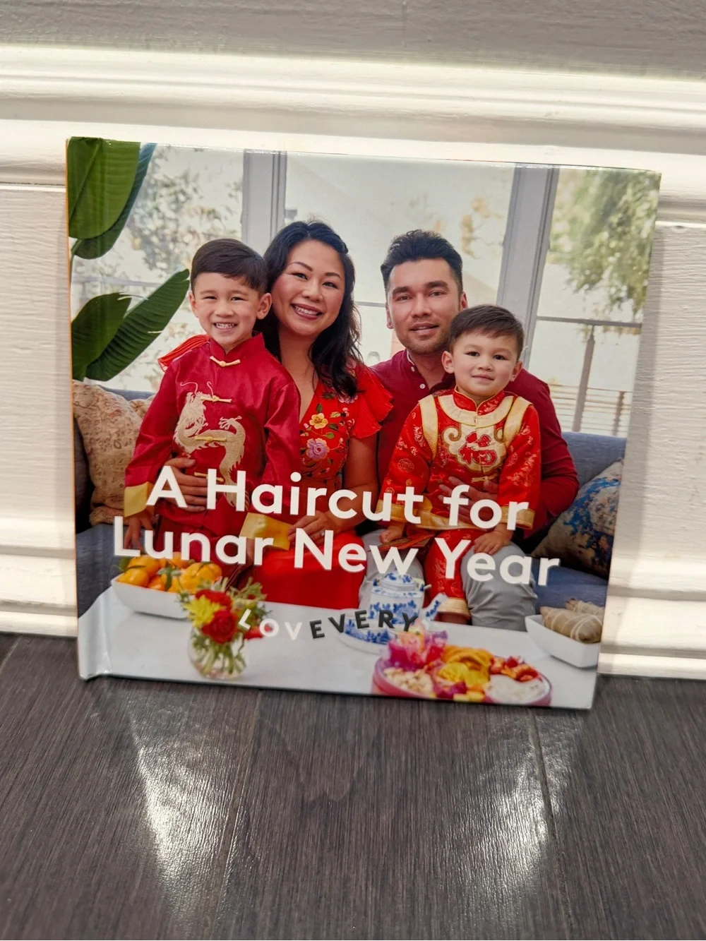 Lovevery Red Lunar New Year Hardcover Storybook A Haircut for Lunar New Year